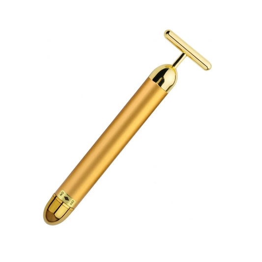 Vista angular do massageador facial terapêutico dourado destacando acabamento luxuoso Loja Morela