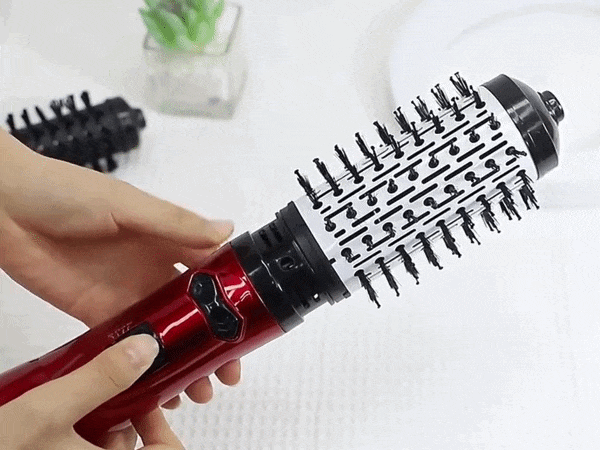 GIF mostrando o funcionamento da rotação automática 360 graus da escova secadora vermelha em detalhes — Loja Morela.