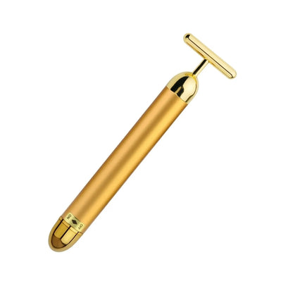 Vista angular do massageador facial terapêutico dourado destacando acabamento luxuoso Loja Morela